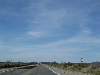 The Sawtooth Range and Snaggletooth (el. 2,180 feet) rise above the Chemehuevi Valley on the slow rise to Lobecks Pass.