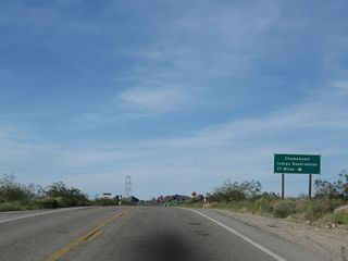 Havasu Lake Road angles southeast east to the Chemehuevi Valley Indian Reservation located along the Colorado River at Lake Havasu. Waters at Lake Havasu area impounded along the Colorado River by Parker Dam.