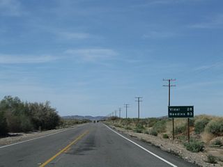 This mileage sign along U.S. 95 north provides the distance to Vidal (28 miles) and Needles (83 miles).