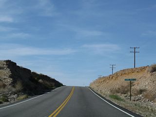 Northbound U.S. 95 approaches Clarks Ranch Road.