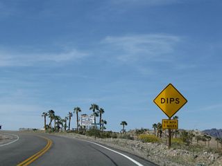 Due to dips along the road, U.S. 95 motorists are advised to reduce their speed to 50 miles per hour for the next seven miles.