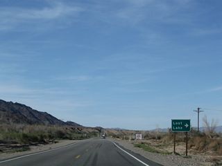 Northbound U.S. 95 approaches the Lost Lake Resort turnoff. Most motorist services (food, gas, and camping) are available at the resort.