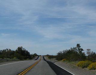 U.S. 95 gradually gains elevation north from 900 feet above sea level in Vidal Valley to 1,326 feet in elevation west of Pyramid Butte.