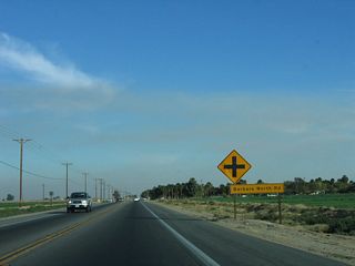 The next signed intersection along eastbound California 98 is with Barbara Worth Road.