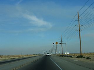 The next signalized intersection is with Menvielle Road, which also travels south to the port of entry.