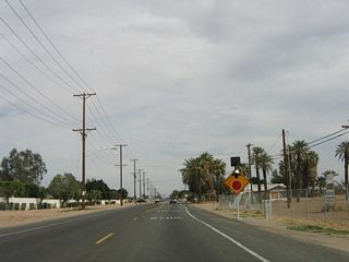 A four-way stop is positioned immediately after the entrance to the city of Calexico for D. Navarro Avenue.