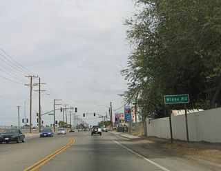 The first signalized intersection is with Kloke Road.