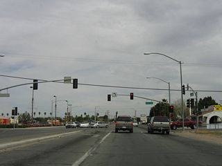 The next signalized intersection along eastbound California 111 is with Ollie Avenue.