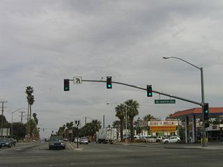 This mileage sign provides the distance to Yuma (54 miles), El Centro (11 miles), and downtown Calexico.
