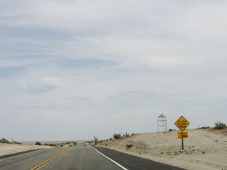 Since California 98 straddles the undulating terrain of the Imperial Valley, so flash floods are possible during the Summer monsoon season or during the winter storm season.