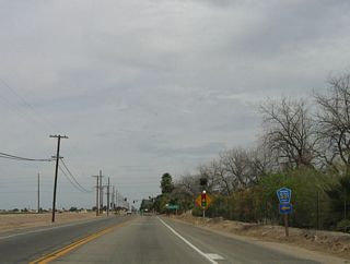 Continuing east, California 98 approaches Imperial County Route S-31, Dogwood Road.