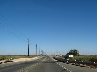 Eastbound California 98 crosses over the Alamo River. which flows from Mexicali north into the United States. From here it flows north into the Salton Sea on a route roughly parallel to the New River. Much of the flow of this river consists of urban and agricultural runoff.
