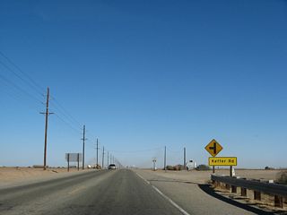 Shortly thereafter, California 98 approaches Keffer Road, which is the old alignment of Imperial County S-32 south of Interstate 8. With the construction of the California 7 expressway, Imperial County S-32 was decommissioned south of Interstate in favor of the state route.