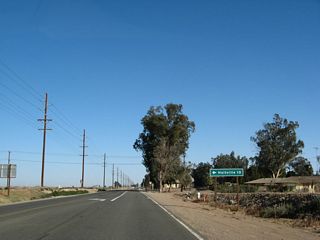 Bonds Corner Road travels due north to Interstate 8, meeting the freeway at Exit 128. From there, Bonds Corner Road turns to the northeast to follow the east bank of the Alamo River to its end in Holtville, some ten miles north of here.