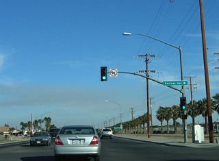The next traffic signal along eastbound California 98 is with Encinas Avenue.