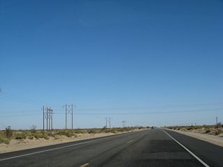 An Imperial Irrigation District power facility is located on the All-American Canal here, which explains the presence of so many power lines converging on this area.