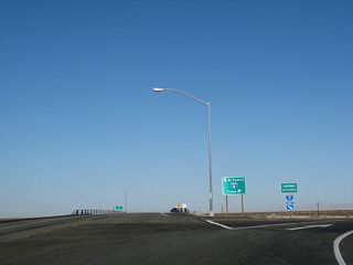 California 98 ends at its junction with Interstate 8. The first ramp connects to Interstate 8 east to Yuma; the left turn connects to Interstate 8 west to El Centro. There is no end shield present.