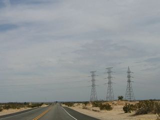 A set of three power lines comes into view ahead; these three lines carry electricity from Mexican power plant north to the Southwest Powerlink, a 500 KV power line that connects Arizona with San Diego.