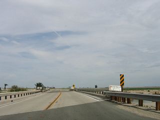 Eastbound California 98 crosses over the Westside Canal, which brings water from the Colorado River to the various farms and ranches located throughout the western Imperial Valley.