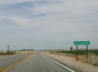 The next intersection along eastbound California 98 is the junction with Imperial County Route S-29, which travels north to Seeley via Drew Road. This intersection is notable for another reason. The section of modern California 98 from Interstate 8 Exit 87 to this point was a later addition to the state route. Originally, California 98 followed what is now Imperial County Route S-29 north to end at U.S. 80 in Seeley. When the state highway was extended, the old alignment was returned to local control and is now part of the county route system.