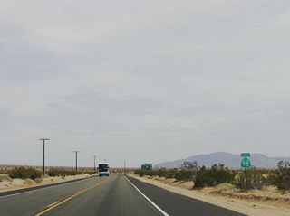 A reassurance shield for California 98 is posted here, followed by a mileage sign.