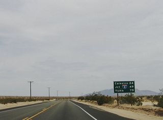 This mileage sign within the Yuha Desert provides the distance to Calexico, the junction with Interstate 8, and Yuma, Arizona.