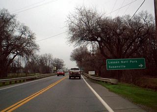 California 36 leads east to Lassen National Volcanic Park and Susanville. This sign photo was taken along northbound California 99 approaching California 36.