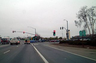 Northbound California 99 meets California 20 at this signalized intersection. California 20 leads east into downtown Yuba City and Marysville, then continues into the foothills via Grass Valley/Nevada City. Turn right here for the continuation of former U.S. 40 Alternate east. Westbound California 20 crosses the Central Valley, passing south of the Sutter Buttes, then crossing the Sacramento River near Colusa. California 20 meets Interstate 5 at Williams, then enters the Coast Range, skirting the north shore of Clear Lake en route to Ukiah and Fort Bragg on the coast.