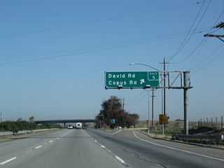 Northbound California 99 meets Exit 5, David Road east and Copus Road west.