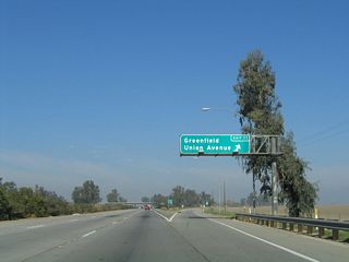 Northbound California 99 (Golden State Highway) meets Exit 11, California 99 Business (Union Avenue) north to Greenfield and Bakersfield. This is a fairly long business route, and it will reconnect to California 99 at Exit 27 (a distance of over 15 miles). The portion of California 99 Business north of California 58 is still within the state highway system and is designated as California 204.