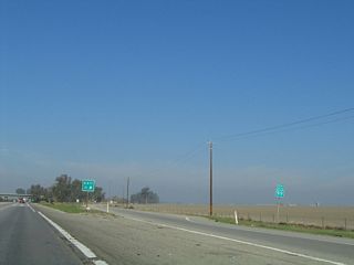 The first business route shield is located right at the gore point along northbound.