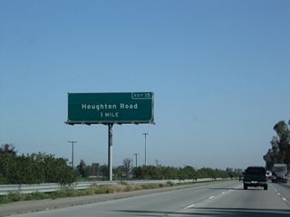 The next exit along northbound is Exit 15, Houghton Road (one mile). As a safety measure to prevent crossover accidents, guardrail was installed within the oleander bushes in the median.