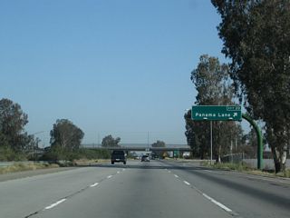 Northbound California 99 (Golden State Highway) meets Exit 20, Panama Lane.