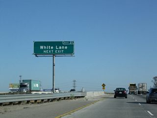 From this interchange, White Lane will travel east to meet with Union Avenue (California 99 Business and Old U.S. 99-399) near its intersection with South Chester Avenue.