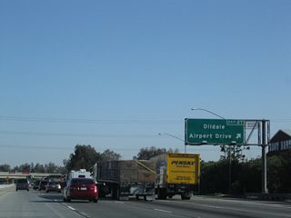 Northbound California 99 (Golden State Highway) meets Exit 27, Airport Drive north to the unincorporated community of Oildale, California 204 (Golden State Avenue) south, and Meadows Field. Airport Drive connects with Exit 6 of the California 204 & California 99 Business freeway, even though there is no direct connection from northbound California 99. The business route and California 204 both transition onto California 99 just north of this interchange.