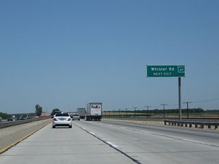 Whisler Road travels west to California 43 (Central Valley Highway) and east to Driver Road, providing local and ranch access.
