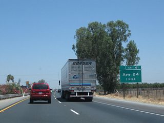 The next exit along California 99 north is Exit 61, Avenue 24 (one mile).