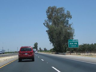 The next exit along California 99 north is Exit 64, Avenue 48 (Armstrong Avenue) and State Street in Earlimart. Use this exit to Old U.S. 99 - Front Street (possibly a former routing of California 99 Business) through Earlimart.
