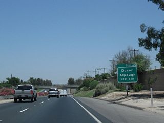 An unsigned route, Tulare County J-22 begins in Alpaugh at the intersection of Road 38 and Tule Road, and extends east along Avenue 54 (Center Avenue), Borchardt Drive and Avenue 56 (Sierra Avenue) to Ducor. It connects with California 43, California 99 and California 65 before ending at Old Stage Road (Mountain 109) in Fountain Springs in the foothills.