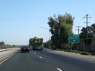 Sign replacements for Exit 65 replaced the destinations of Ducor and Alpaugh with Avenue 56 (Sierra Avenue). The practice of signing the intersecting roadway's name rather than destinations was adopted in the MUTCD and has been implemented as guide signs have been replaced.