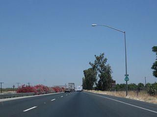 A California 99 north confirming marker is posted after the on-ramp from the Avenue 72 and Avenue 76 interchange.