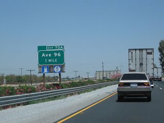 The next exit along California 99 (Golden State Highway) north is Exit 70A, Tulare County J-24 (Terra Bella Avenue) to Historic U.S. 99 (Main Street) north. CR J-24 (Avenue 96) heads west to unincorporated Pixley (population 3,310 as of 2010 Census) and east to Terra Bella.