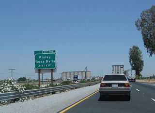 Tulare County J-24, just like CR J-22 in Earlimart, is generally unsigned. CR J-24 is assigned to run from California 99 (Exit 70A) east along Avenue 96 / Terra Bella Avenue, ending at California 65 near Terra Bella for a distance of 13 miles (the route was realigned onto Avenue 95 at the very eastern end of the county road). CR J-24 has a very short unsigned overlap with CR J-27 (Road 192), a north-south county road that connects CR J-22 east of Earlimart with California 65 and California 137 west of Lindsay.