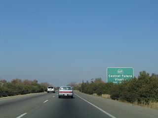 The next exit along California 99 north is Exit 87, California 137 (0.25 mile). California 137 passes through the central part of the city of Tulare just west of the freeway. To the west, California 137 connects to the southern terminus of California 63 before terminating at California 65 at Cairns Corner.