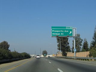 Northbound California 99 reaches Exit 88, Hillman Street and Prosperity Avenue.