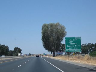 The next exit along California 99 (Golden State Highway) north is Exit 96, California 198 east (one mile), followed by Exit 97, which connects to California 198 west. California 198 leads east into Visalia, culminating its journey upon reaching Sequoia National Park and Kings Canyon National Park. The state route ends in the national parks, and it does not cross the Sierra Nevada.