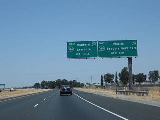 California 99 north approaches Exit 96, California 198 east to Visalia and Sequoia National Park (next right). California 198 is a freeway from California 99 east to near Exeter (near where it meets California 65). The second off-ramp (Exit 97) connects California 99 north to California 198 west to Hanford, Lemoore, and Coalinga.