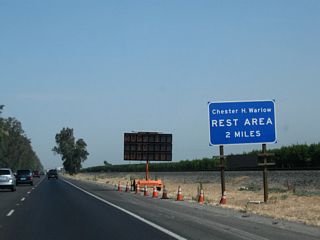 Exit 109 leads to the Chester H. Warlow Roadside Safety Rest Area. This rest area features restrooms, water, vending machines, pet exercise area, and parking. To access the rest area, use Exit 109 and turn right and then left into the facility.