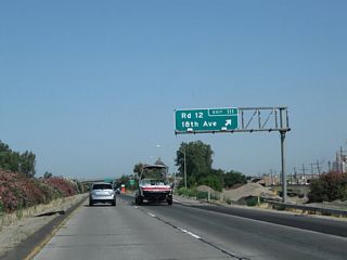 Northbound California 99 meets Exit 111, Road 12 south and 18th Avenue (Mendocino Avenue) north to Kingsburg. After passing through Kingsburg, 18th Avenue turns into Mendocino Avenue en route to Parlier.