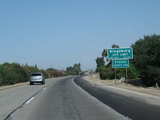 California 99 leaves Tulare County and enters Fresno County and the city of Kingsburg. Fresno County is one of the more populous counties in California, with 930,450 residents as of the 2010 Census. The county spans the Central Valley (San Joaquin Valley), with both Interstate 5 and California 99 crossing the county from south to north. Kingsburg, the first city along California 99 in Fresno County, had a population of 11,382 as of the 2010 Census and was incorporated on May 29, 1908.